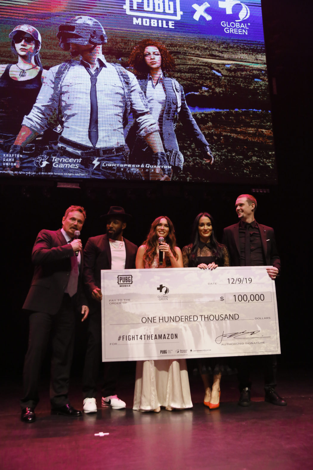 Megan Fox presents PUBG MOBILEs donation to Global Green with her Team Foxy teammates Stephen Twitch Boss Nikki Bella and Pickles Ryan Miller