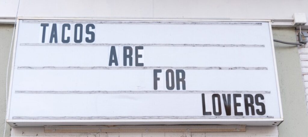 tacos are for lovers sign on store in nyc rltheis t20 OpeRY2